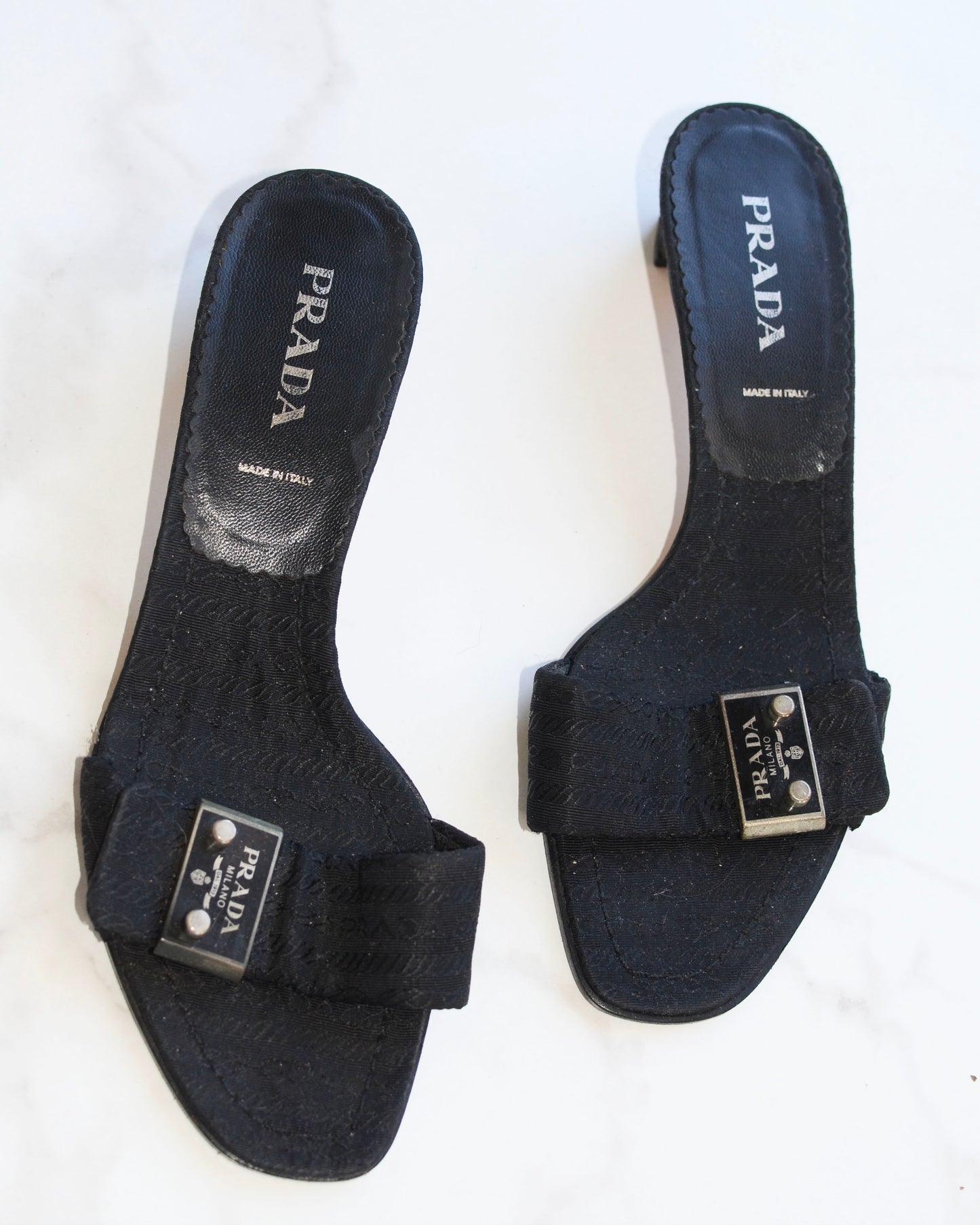 Prada Metal Logo Plaque Kitten Heel Slip On Mules