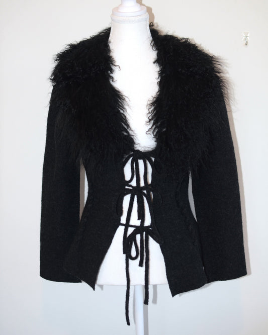 Black Roberto Cavalli jacket with faux fur  trim on a mannequin against a white background