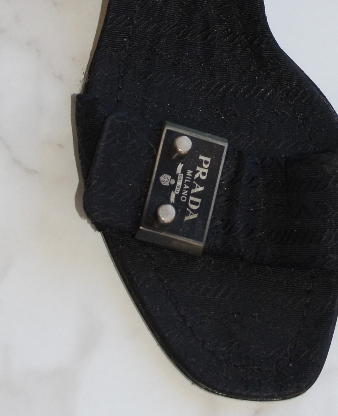 Prada Metal Logo Plaque Kitten Heel Slip On Mules